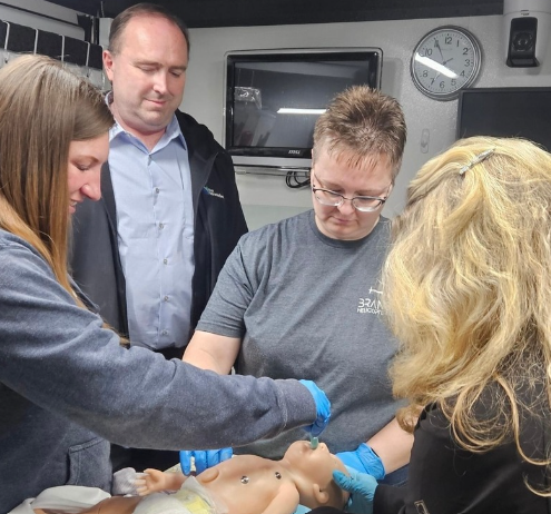 John Bongers and Sara Hopfar complete Brainard's Volunteer Fire Department & EMT training. 
